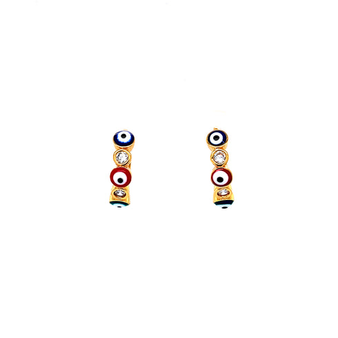 A close-up of two Multicolor Evil Eye Huggies Earrings Zirconia Stones set against a white background, each featuring a vertical row of four circular elements crafted from 18k Gold-filled material. The top and bottom elements are blue, the second element is adorned with Multicolor Zirconia that resembles a clear gem, and the third element is red.